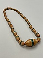 Necklace of 26 oval cylinders, Beeswax and straw, Songhay